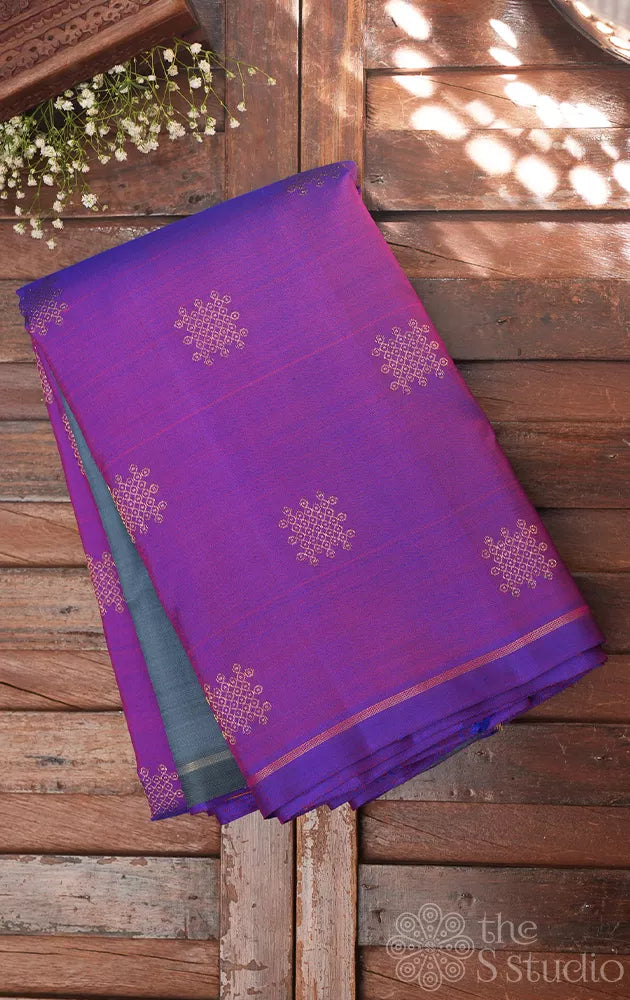 Purple kanchipuram silk saree with kolam buttas and double pallu