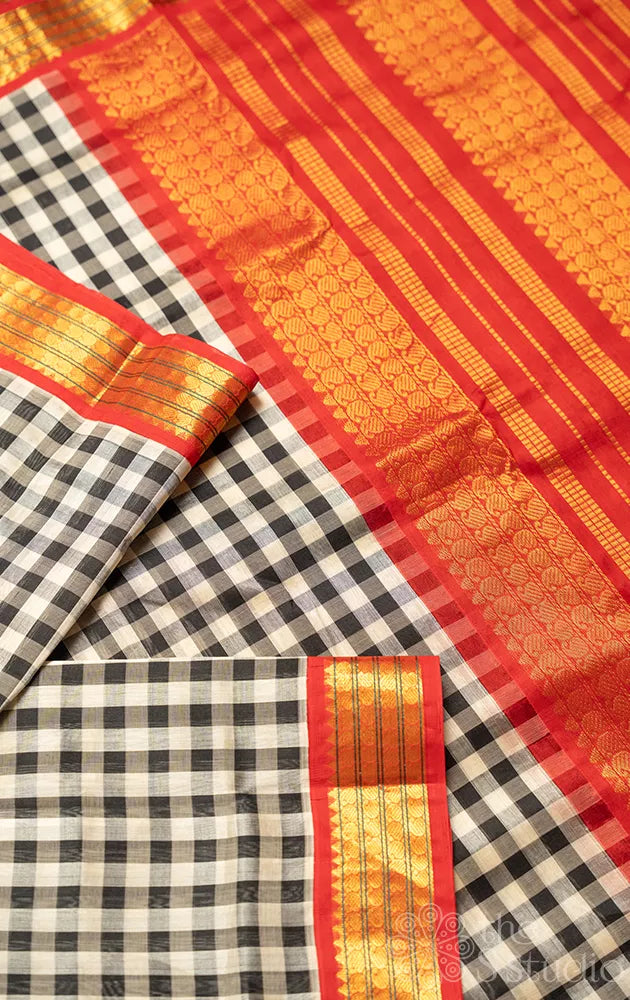 Black and white checked silk cotton saree with korvai border