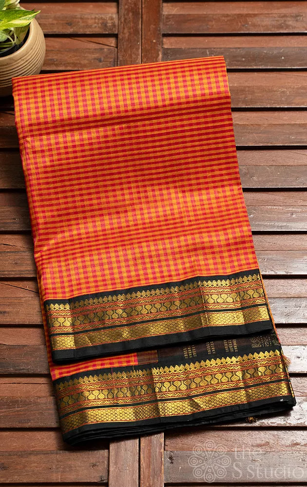 Rani pink and yellow checked silk cotton saree with green border