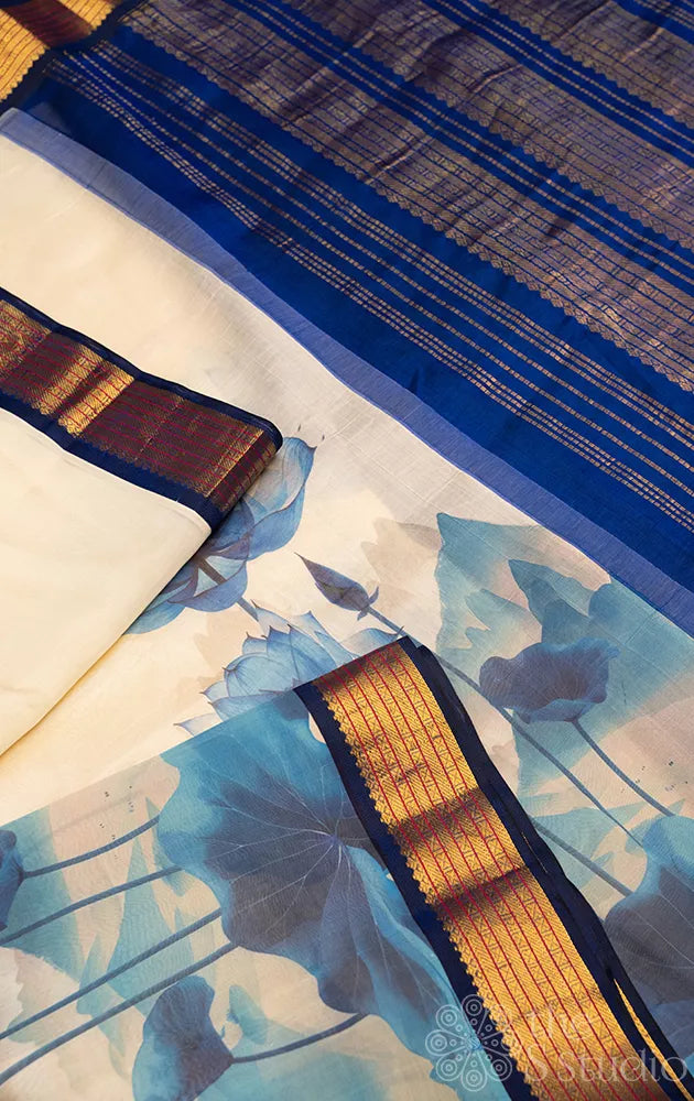 White lotus digital printed silk cotton saree with korvai blue zari border