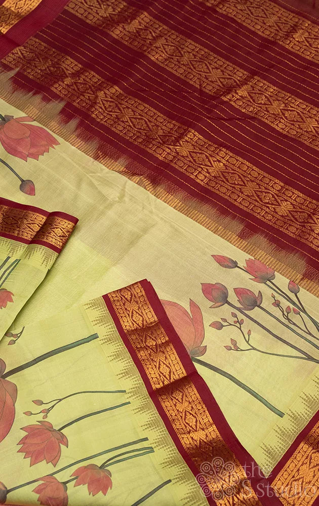 Green lotus printed silk cotton saree with korvai brown border