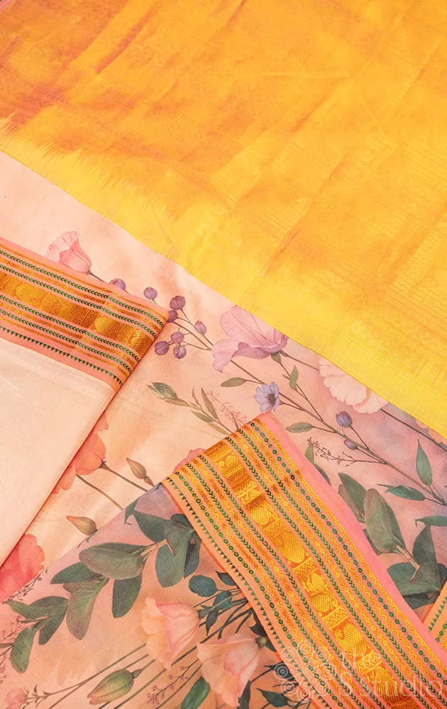 Light peach floral printed silk cotton saree with pink korvai border