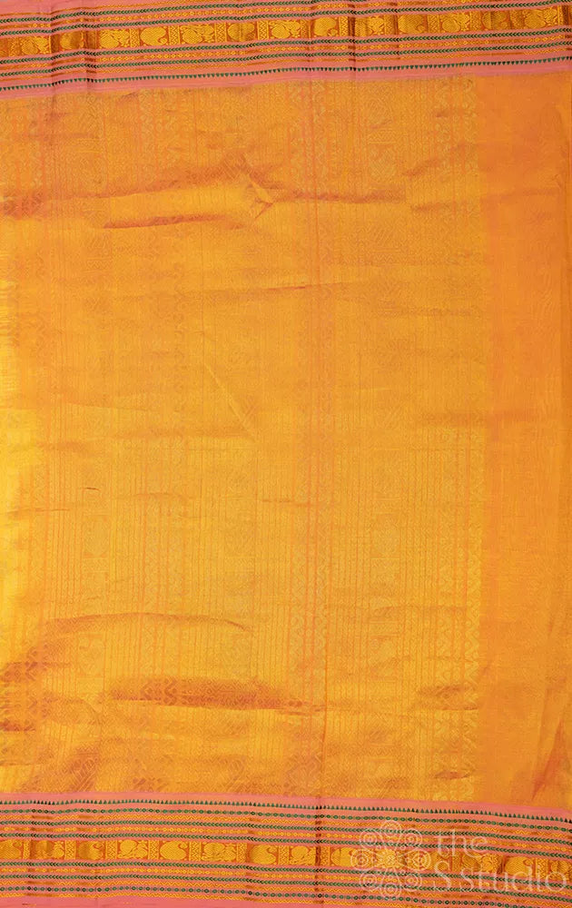 Light peach floral printed silk cotton saree with pink korvai border