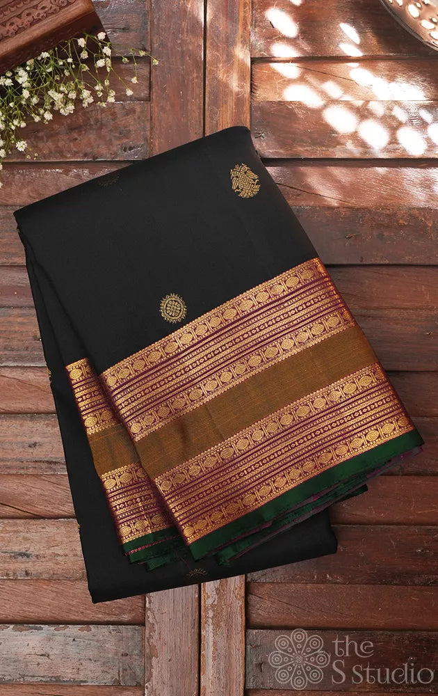Black kanchipuram silk saree with rettaipet zari border