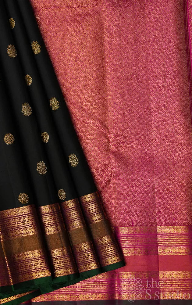 Black kanchipuram silk saree with rettaipet zari border