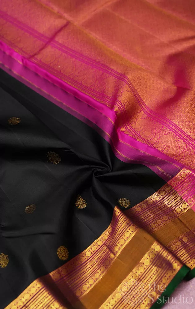 Black kanchipuram silk saree with rettaipet zari border
