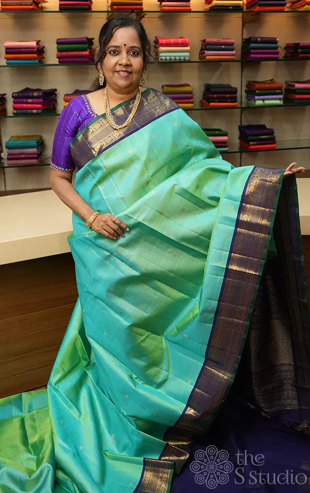 Sea green vairaoosi kanchi silk saree with korvai blue border