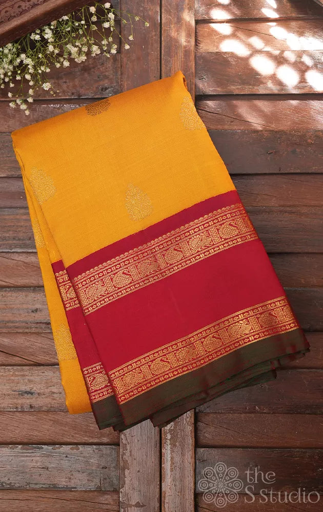 Mustard kanchi pattu saree with korvai maroon border