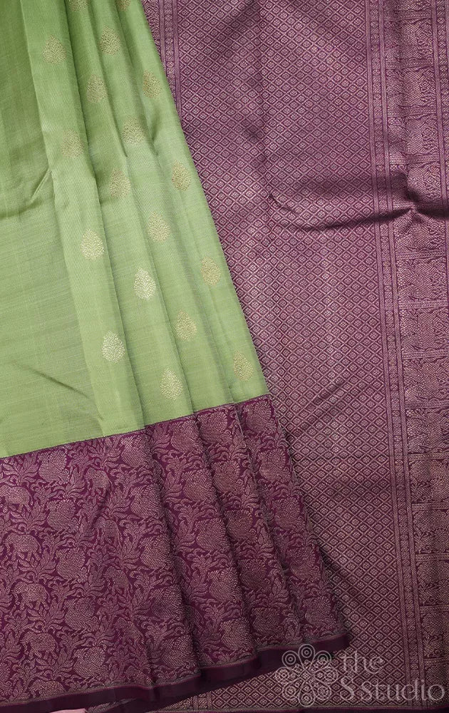 Elachi green kanchi silk saree with korvai purple long border