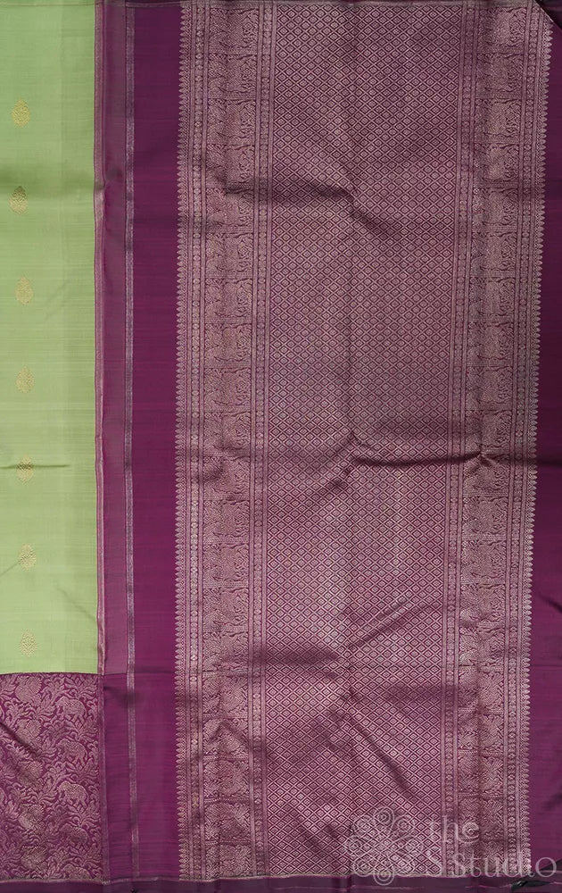 Elachi green kanchi silk saree with korvai purple long border