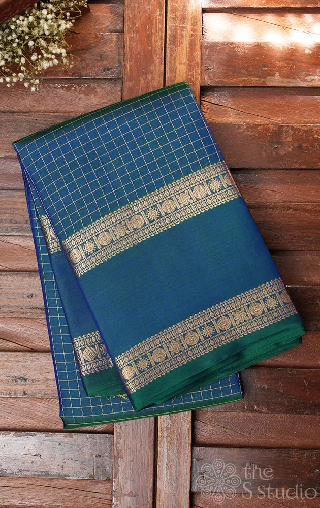 Peacock blue zari checked kanchi pattu saree with rettaipet zari border