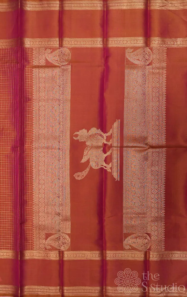 Peachish mustard kanjivaram silk saree with zari checks and rettaipet border