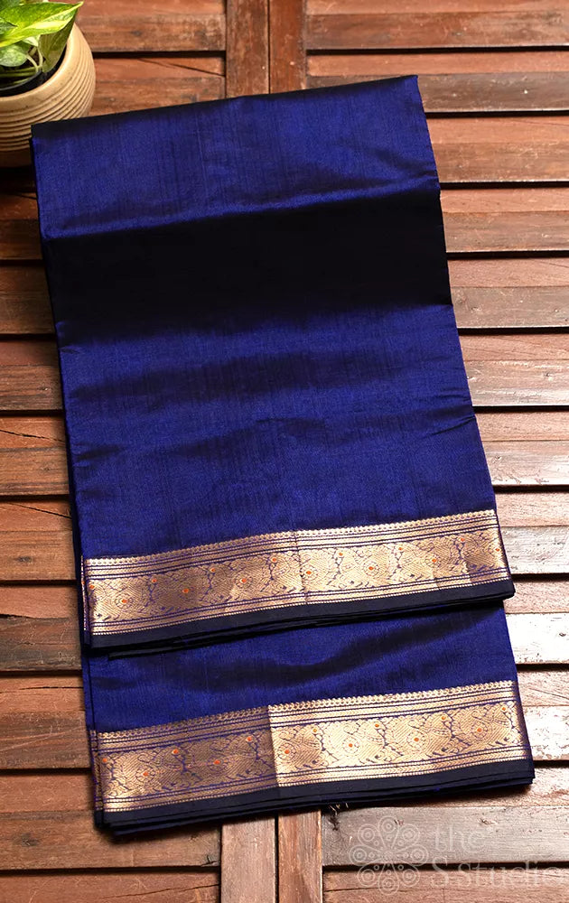 Navy blue silk cotton saree with small zari border