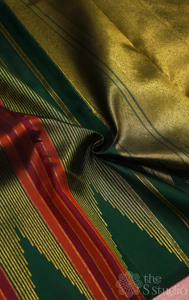 Green 8 kol woven kanjeevaram silk saree with rust panel design