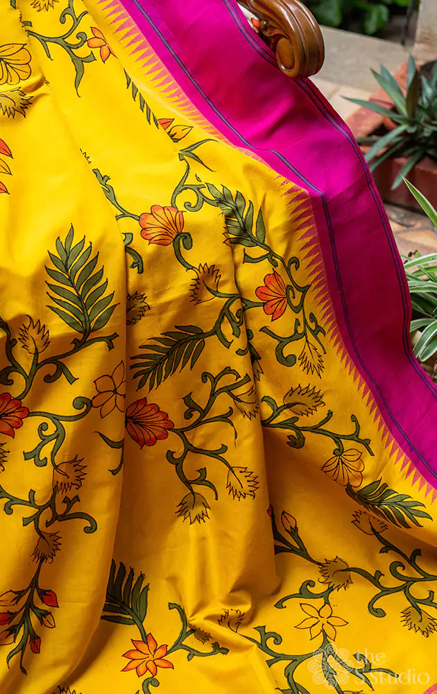 Yellow and rani pink border kanchi silk saree with hand painted kalamkari