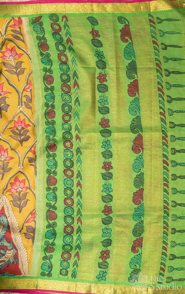 Mustard pen kalamkari hand painted kanchipuram silk saree with green pallu and small border