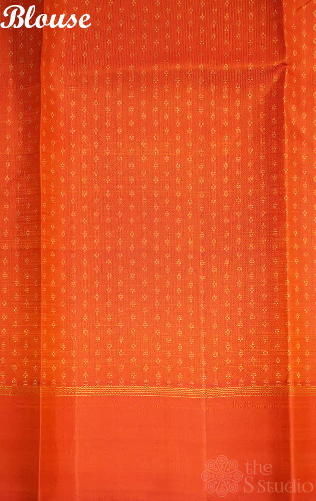 Off white with orange printed kanjivaram saree
