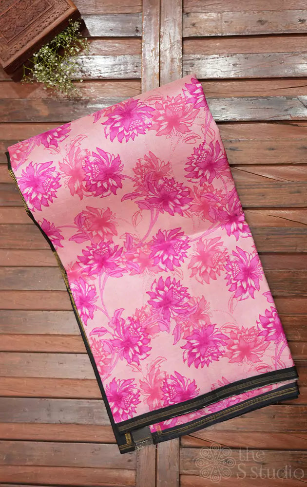 Light pink kanchi silk saree with floral prints and black pallu