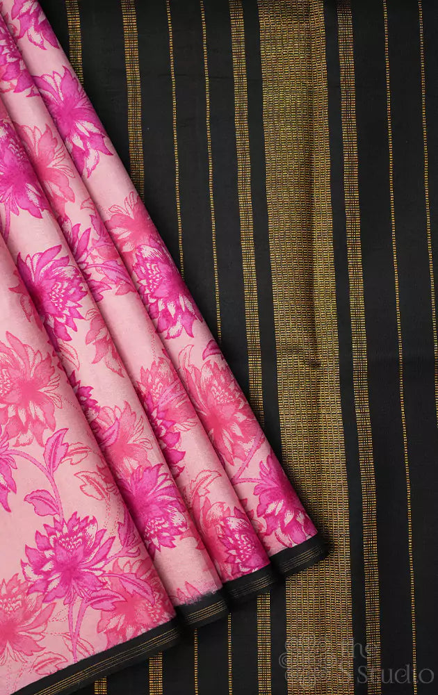 Light pink kanchi silk saree with floral prints and black pallu