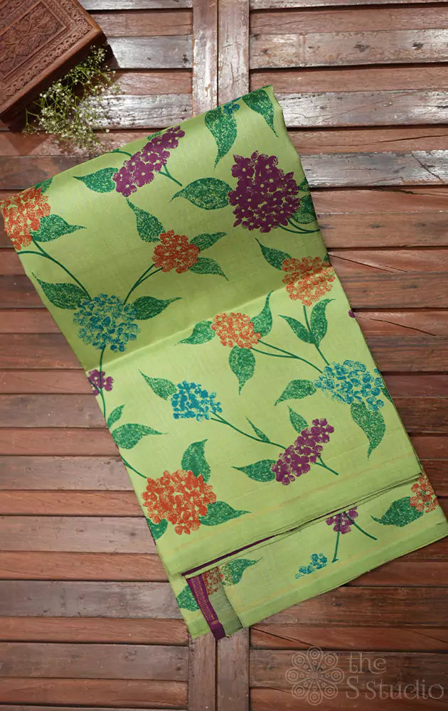 Elachi green kanchipuram silk saree with floral prints