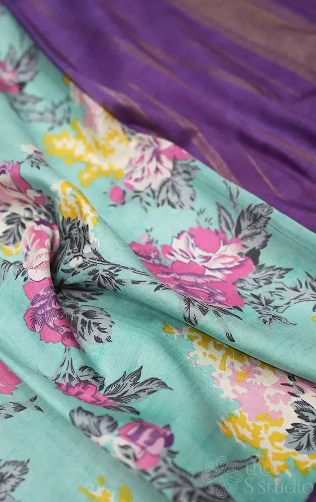 Aqua blue kanchi silk saree with purple pallu and all over prints