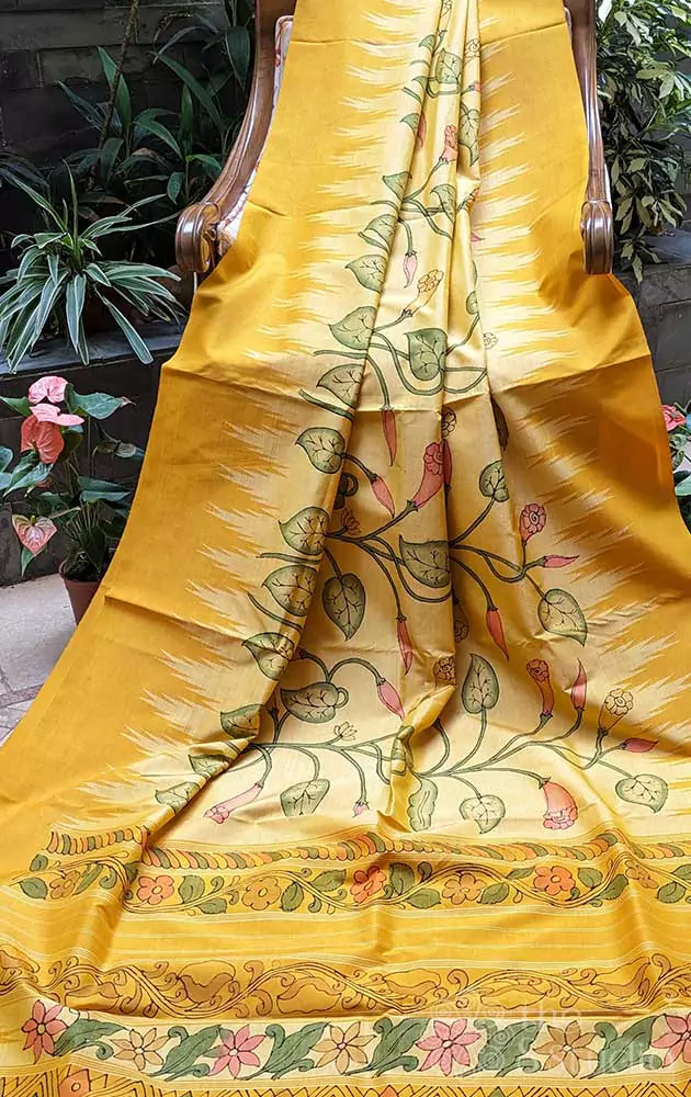Light yellow kanchi pen kalamkari saree with floral motifs
