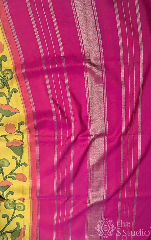 Yellow kanchipuram silk saree with kalamkari hand painting and a contrast rani pink pallu