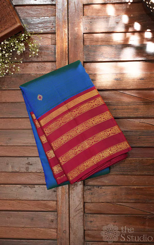 Royal blue kanjivaram saree with korvai maroon border