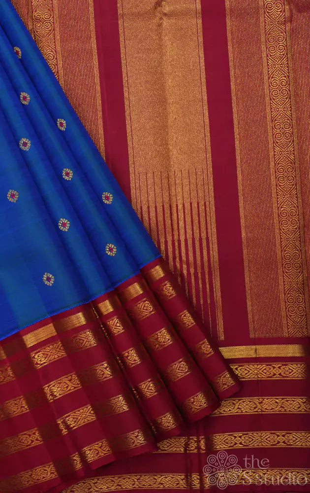 Royal blue kanjivaram saree with korvai maroon border