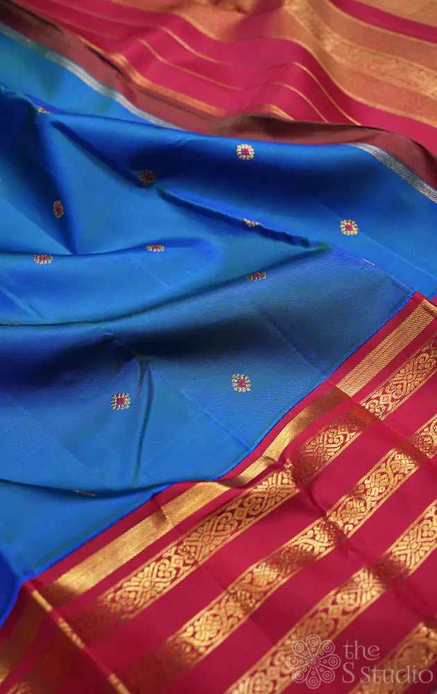 Royal blue kanjivaram saree with korvai maroon border