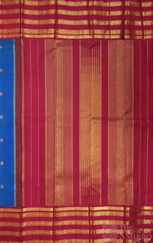 Royal blue kanjivaram saree with korvai maroon border