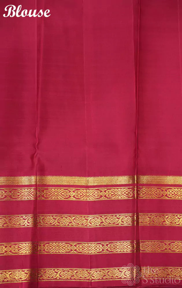 Royal blue kanjivaram saree with korvai maroon border