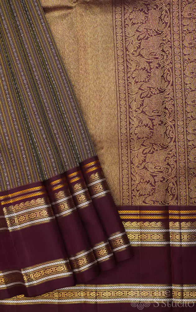 Deep brown kanjivaram saree with thread woven body and a zari rich border