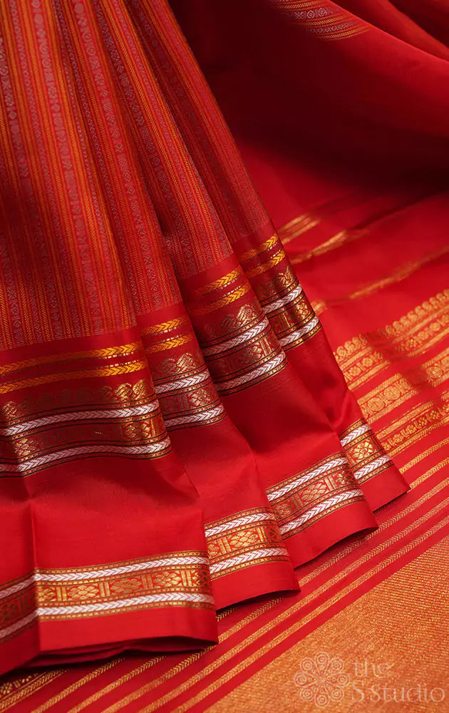 Red kanjivaram saree with thread woven body and a zari rich border