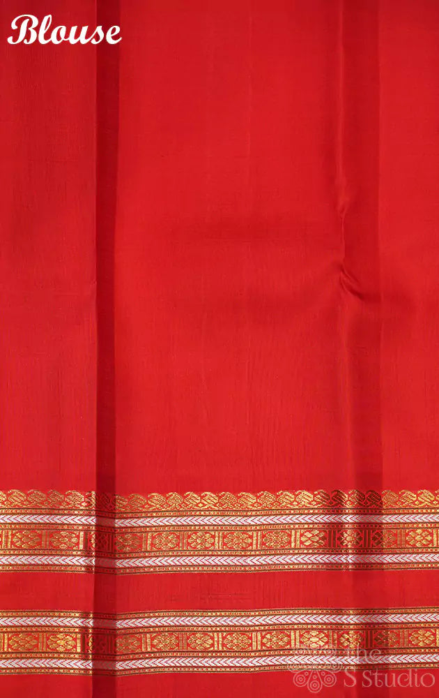 Red kanjivaram saree with thread woven body and a zari rich border