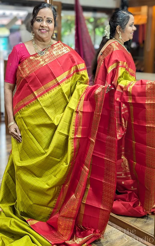Green checked adai kanjivaram silk saree with red border