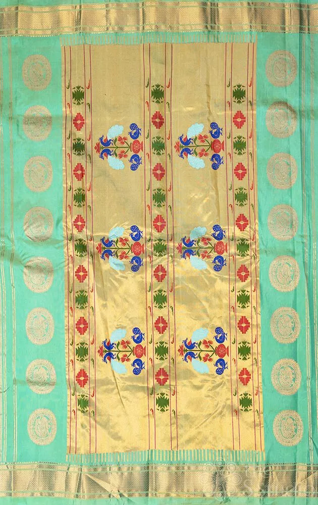 Sea green colour gadwal silk saree with zari buttas