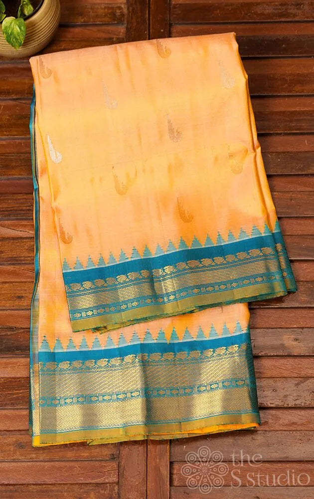 Light orange gadwal silk saree with blue border