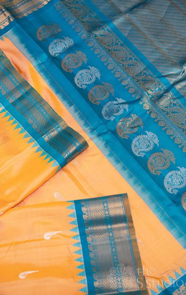 Light orange gadwal silk saree with blue border