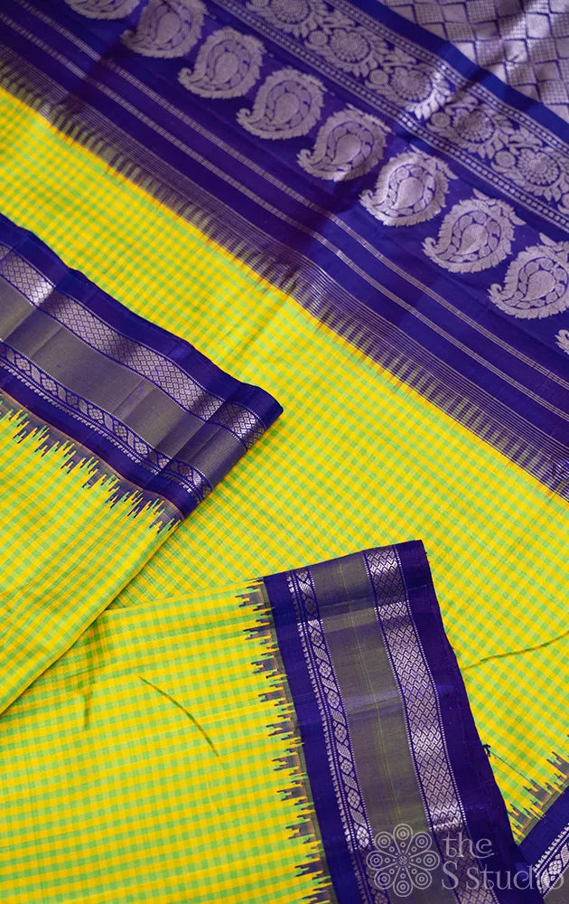 Green and yellow checked gadwal silk saree with navy blue pallu