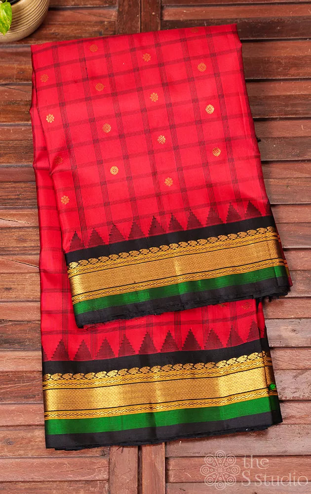 Red checked gadwal silk saree with black pallu and zari rich pallu