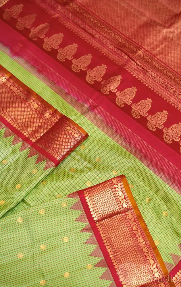 Sage green checked gadwal silk saree with red zari border