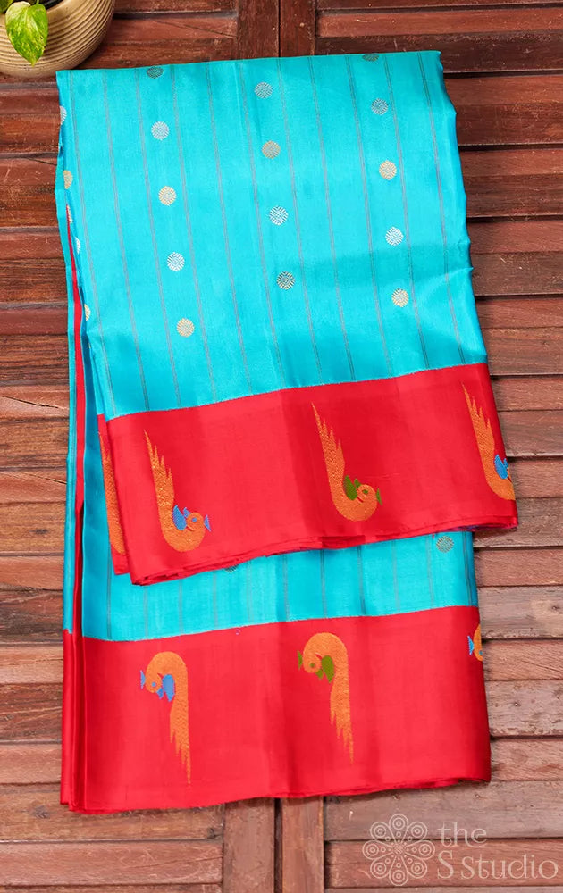 Light blue gadwal silk saree with red paithani style border