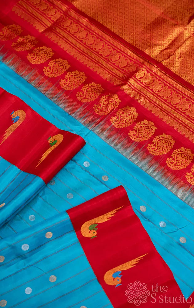 Light blue gadwal silk saree with red paithani style border