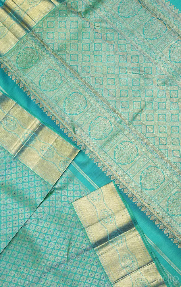 Sea green kanchipuram silk saree with all over design