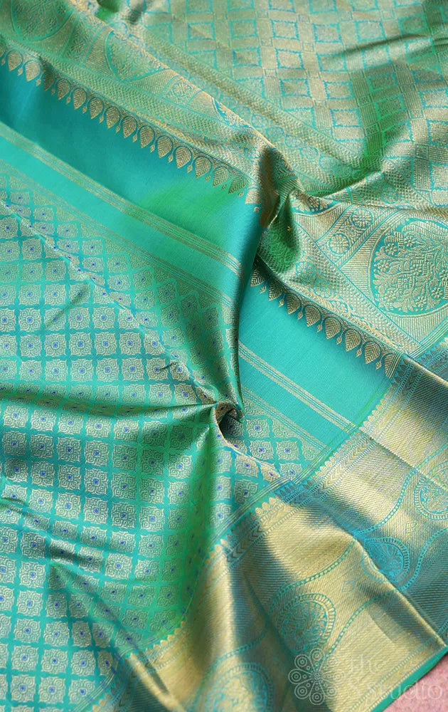Sea green kanchipuram silk saree with all over design