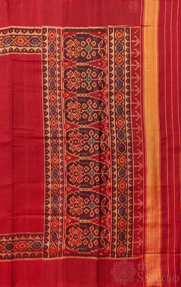 Maroon patola raw silk saree with ikat woven border