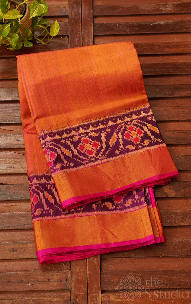 Peach patola raw silk saree with ikat woven purple border