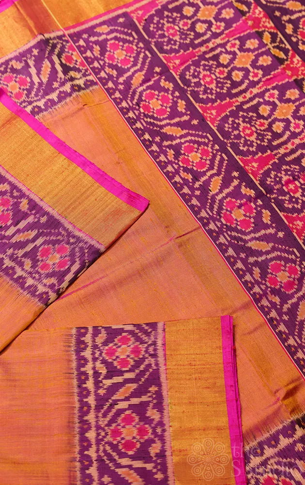 Peach patola raw silk saree with ikat woven purple border