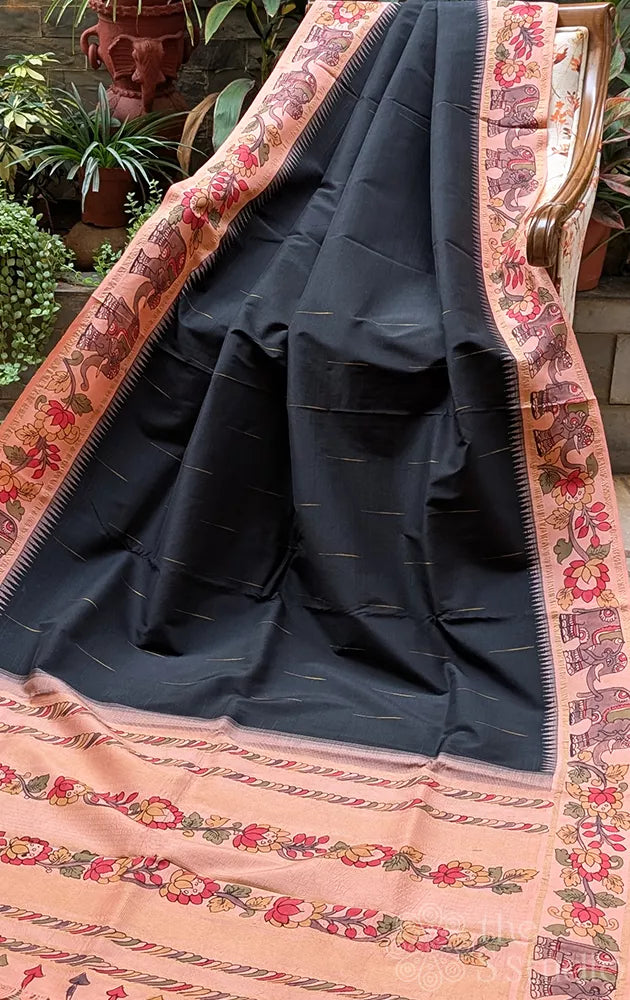 Black kanchi silk saree with hand painted kalamkari peach border
